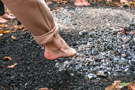 People Walk On Hot Coals Barefoot.