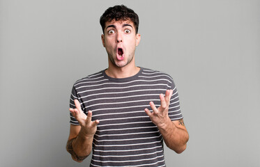 open-mouthed and amazed, shocked and astonished with an unbelievable surprise