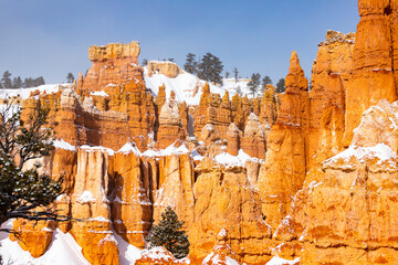 cold winter in bryce canyon national park, close-up on unique rock formations in utah covered in...
