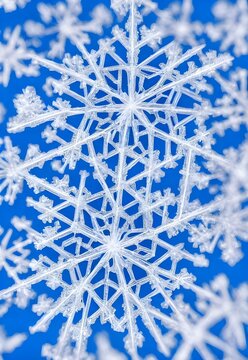 The sparkling snowflake crystal is close up in the picture. It has many delicate points and seems to be floating on air.