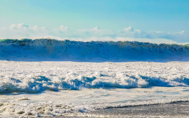 Extremely huge big surfer waves at beach Puerto Escondido Mexico.