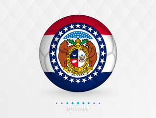 Football ball with Missouri flag pattern, soccer ball with flag of Missouri national team.