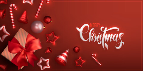 Naklejka premium merry Christmas banner. Flat lay red monochrome design of realistic christmas bell, balls, star and gift box for greeting cards 