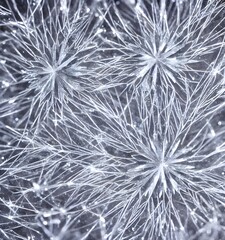 A camera zooms in on a single, spinning snowflake. The background is blurred white, and the flake itself is sharply defined against it. Its delicate structure of arms radiating out from a central poin