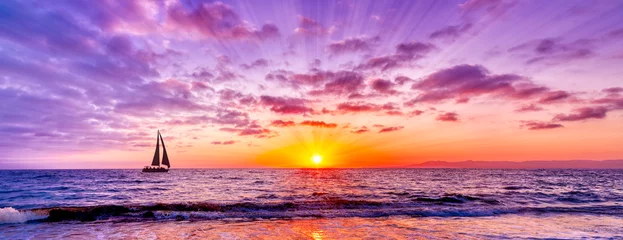 Zelfklevend Fotobehang Sunset Ocean Sailboat Uplifting Inspirational Sunrise Surreal Hope Banner Header © mexitographer