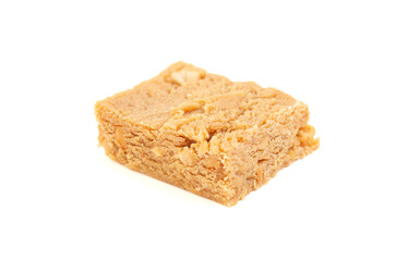 A Piece of Peanut Butter Fudge Isolated on a White Background