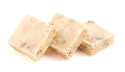 Pieces of Maple Walnut and Pecan Fudge Isolated on a White Background