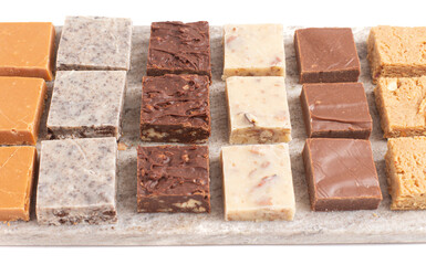 Assortment of Various Flavors of Fudge Isolated on a White Background