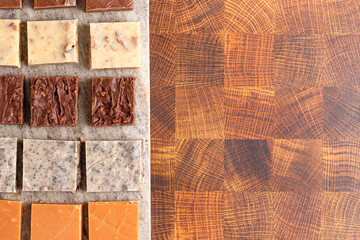 An Assortment of Various Flavors of Fudge on a Wood Butcher Block