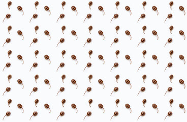 Christmas pattern from sequoia cones on white background. Wonder of natural design.Gift wrapping paper design. Creative copy space