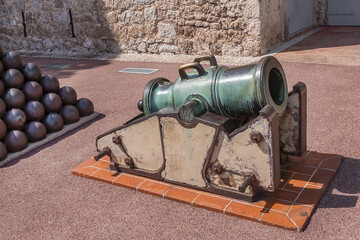 Old cannon near Prince's Palace of Monaco (built in 1191). Principality of Monaco, French Riviera, Western Europe.