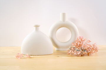 Minimal Scandi Style Nordic Vases on beige background. On trend minimalist Scandinavian interior.