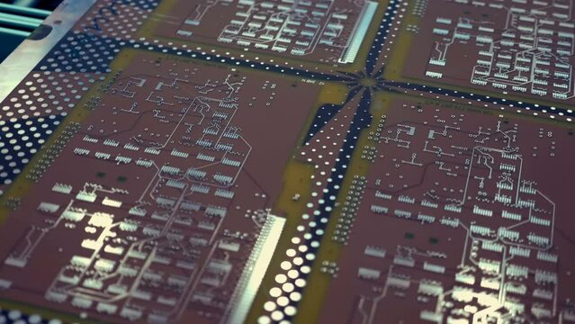 Samples of blank factory printed circuit boards (PCBA) as exhibition samples. Shot in motion. Closeup
