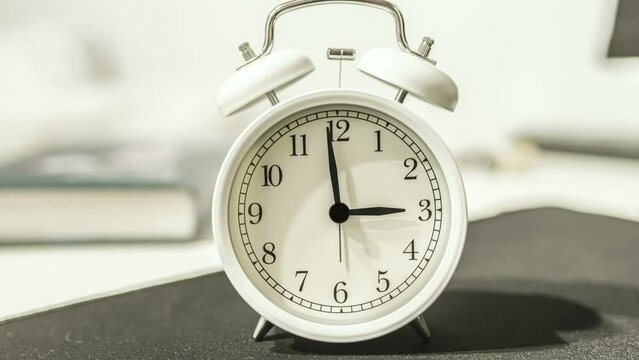 Vintage alarm clock time lapse,fast time flowing stress concept, analog clock motion