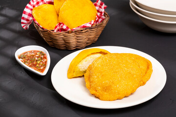 Tasty Fried Cakes Filled With Chicken - Traditional Colombian Cuisine