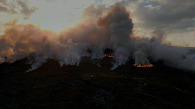 Heather burning on moorland above Holmfirth in West Yorkshire.