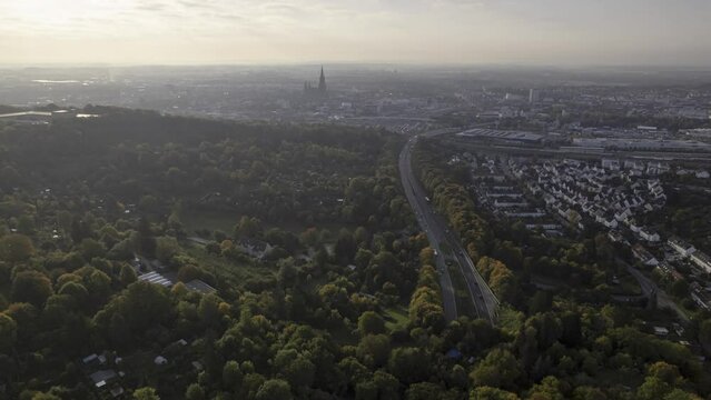 Road leading to Ulm city at morning in autumn aerial time lapse