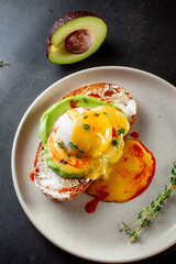 fried eggs with herbs on tost