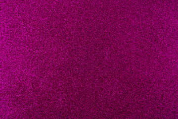 Background with sparkles. Backdrop with glitter. Shiny textured surface. Dark pink