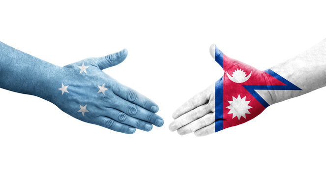 Handshake between Micronesia and Nepal flags painted on hands, isolated transparent image.