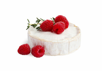 Brie cheese served with raspberries isolated on white