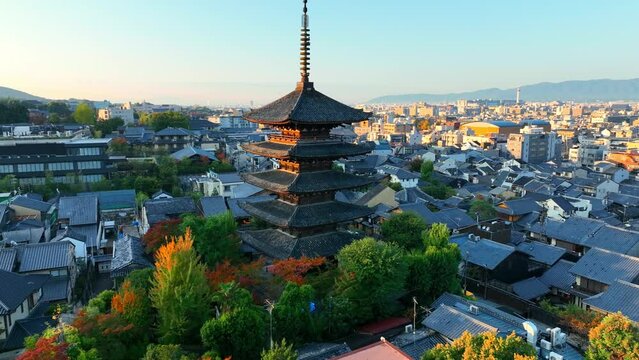 Kyoto aerial view with Yasaka pagoda at sunrise, Japanese cultural centre, Kyoto, in the morning, flying around famous shrine of Yasaka pagoda
