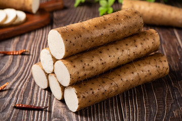 fresh Chinese yam on wooden table