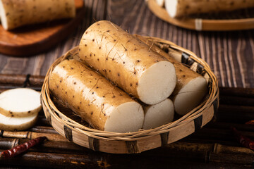fresh Chinese yam on wooden table