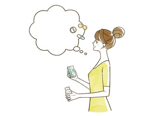 薬やサプリメントについて考えている女性