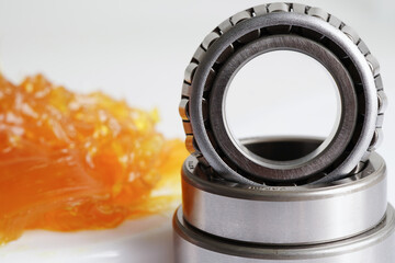 Grease and ball bearing, lithium machinery lubrication for automotive and industrial.