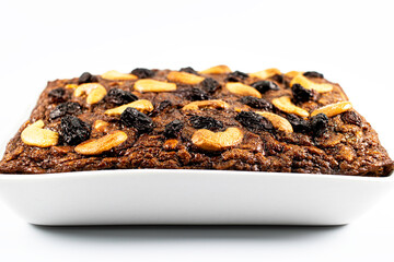 Close-up Homemade banana cake on a white square plate