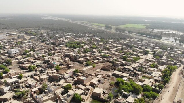 Drone view of rows of buildings and hut at Khairpur Sindh in a summer day.