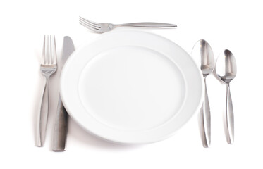 A Table Set with a Clean and Emtpy White Set of Dishes and Silverware Isolated on a White Background