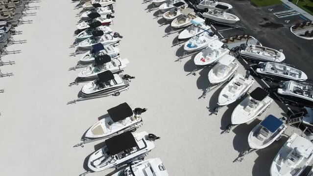 aerial spin over a large recreational boat sales yard full of new boats