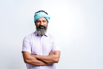 Indian farmer giving expression on white background.