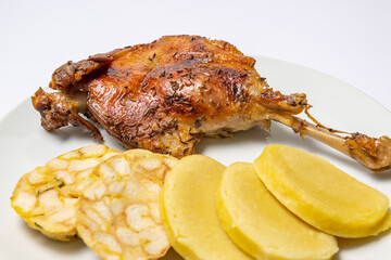 Roast duck, goose with dumplings and cabbage