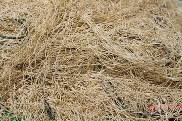 background and texture a fishing net belonging to a fisherman in the sea