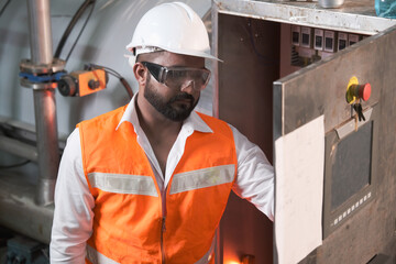 South Asia male factory worker or Man engineer or expert staff is maintenance and checking control...