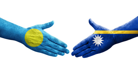 Handshake between Nauru and Palau flags painted on hands, isolated transparent image.