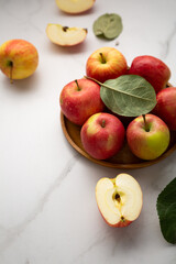 Fresh ripe organic apples on plate whole and slice food  harvest concept
