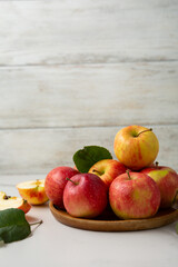 Fresh ripe organic apples food and wooden background harvest concept