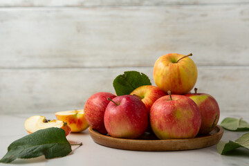 Naklejka na ściany i meble Fresh ripe organic apples food background harvest concept