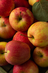 Fototapeta na wymiar Overhead view of fresh ripe organic apples food background harvest concept