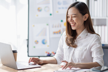 Business woman using calculator for do math finance on desk in Home office, Asian female finance business tax, accounting, statistics and analytic research concept