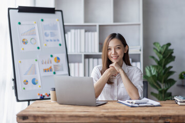 Business woman using calculator for do math finance on desk in Home office, Asian female finance business tax, accounting, statistics and analytic research concept