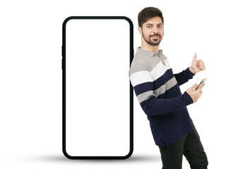Smiling Indian Man with Thumbs Up and Large Smartphone. Positive Asian male posing with enthusiasm, giving a thumbs up smartphone. Happy Indian Guy Holding Big Smartphone, Transparent PNG