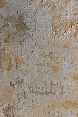 Background texture of wall with peeling stucco in Puglia, Italy