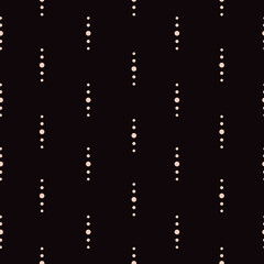 Dots are a vertical vector pattern. Dark neutral background