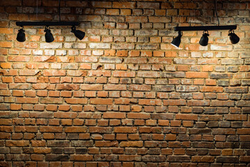 Old brick wall with stage lights