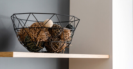 Fototapeta na wymiar minimalism concept - basket with natural balls